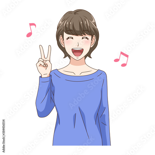 笑顔でVサインする女性