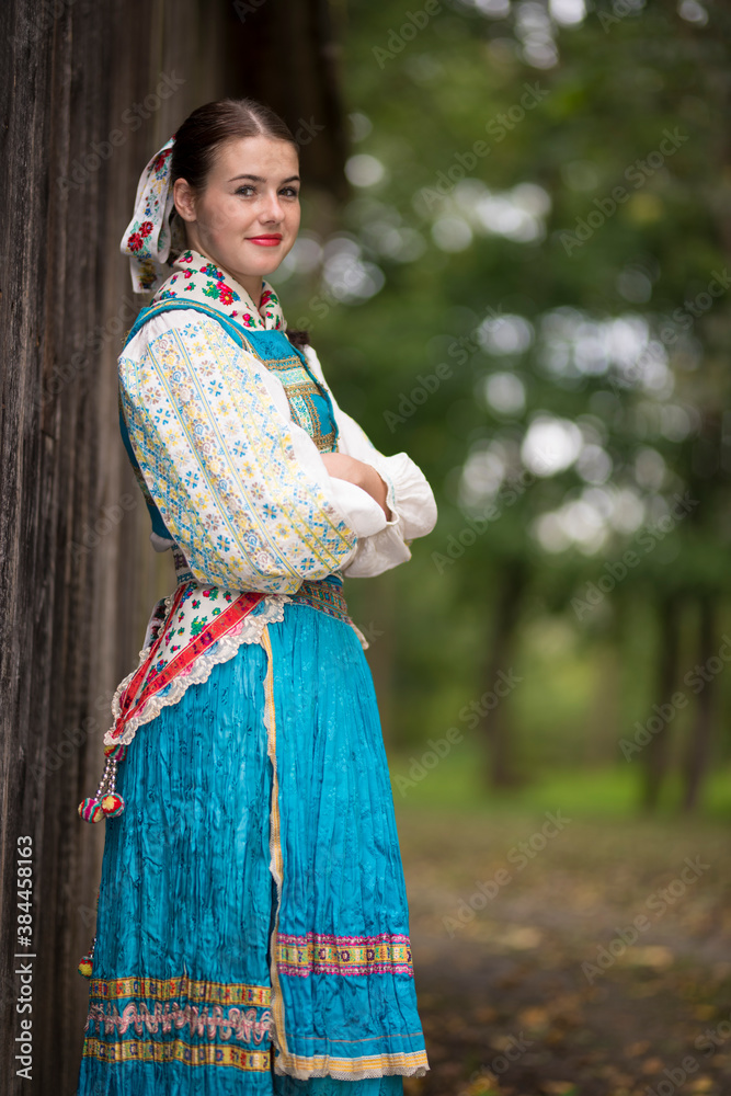 Slovak folklore. Traditional costume. Beautiful girl in traditional dress.