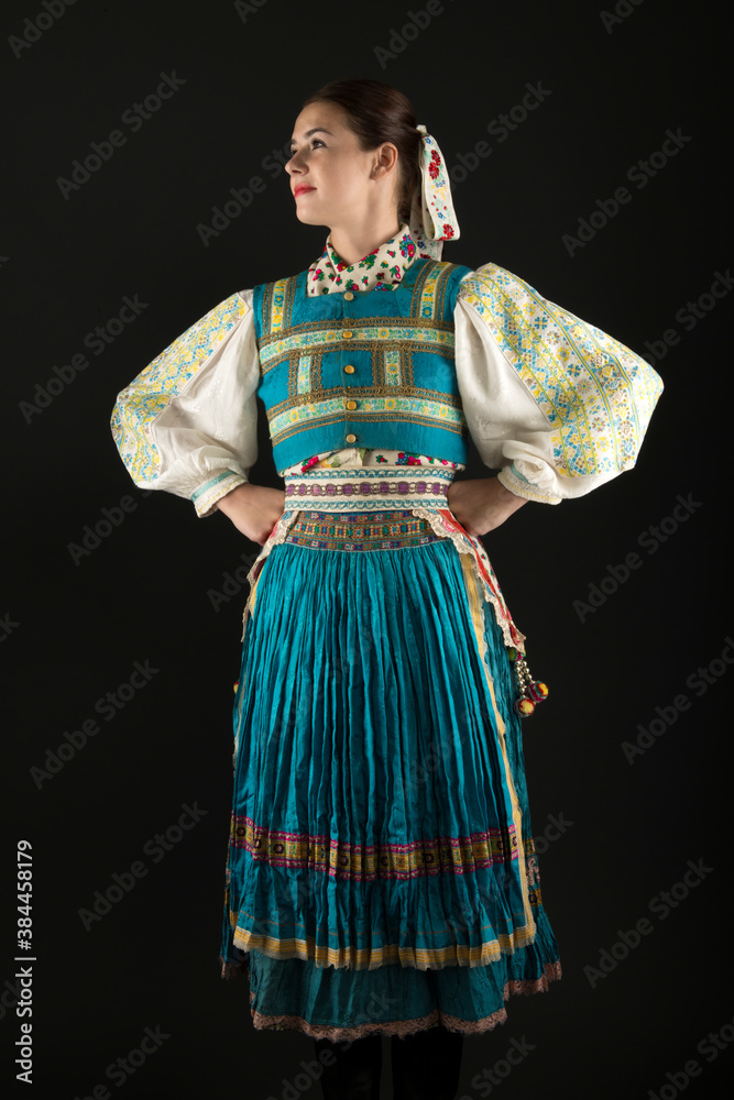 Slovak folklore. Traditional costume. Beautiful girl in traditional dress.