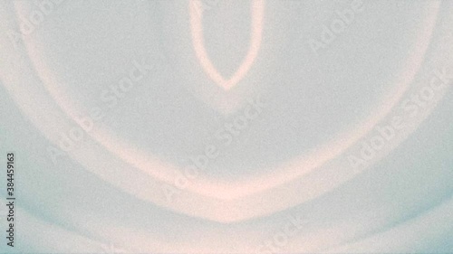 Abstract retro background. Symmetric animated shapes changing form and color.