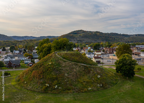 Aerial drone shot of the ancient historic native American burial mound in Moundsville, WV photo