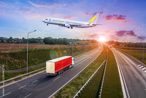 Wallpaper Mural the plane flies over the truck  .  Logistics and transportation Torontodigital.ca