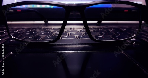 Glasses on the keys © Jitendra Singh