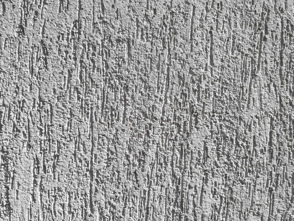 Wall, Textured, Abstracts, Backgrounds. Photograph of a textured white wall. In Brazil it is known as a graffiti wall ( Parede com grafiato )