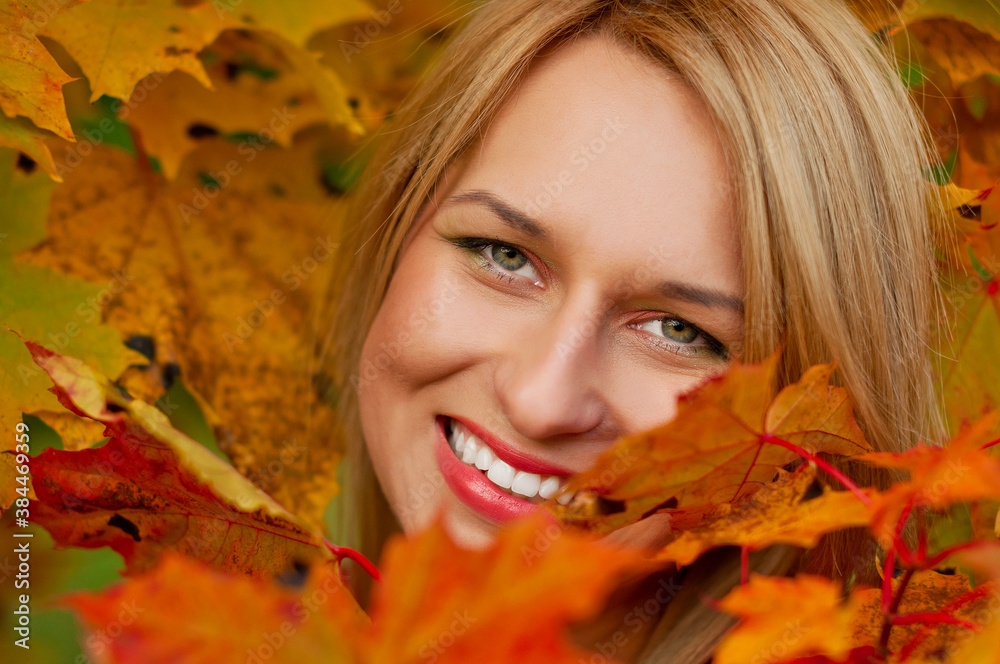 Autumn woman on leafs background Autumn woman on leafs background