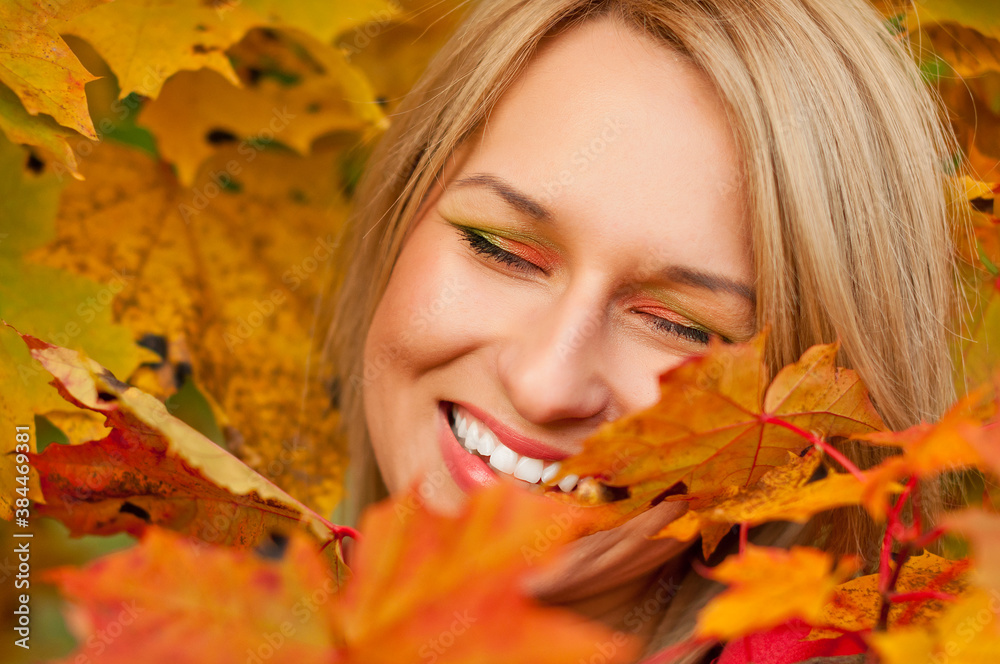 Autumn woman on leafs background Autumn woman on leafs background