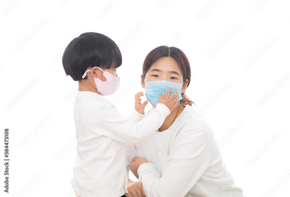 Daughter is helping mother to wear a mask during Coronary Pneumonia Daughter is helping mother to wear a mask during Coronary Pneumonia