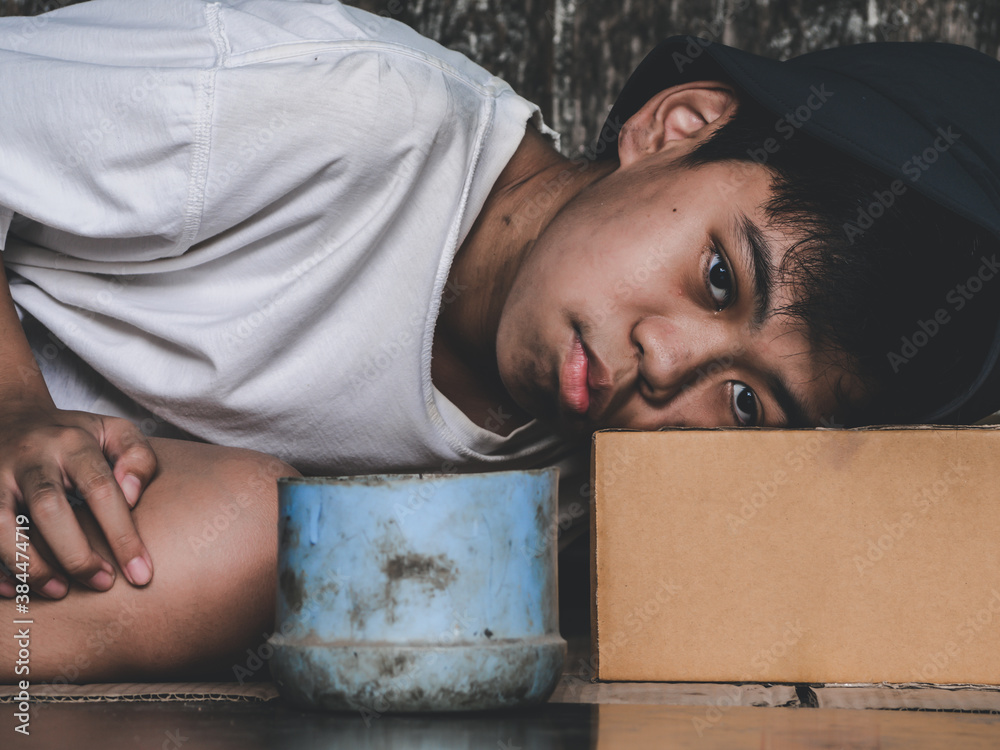 Ταπετσαρία Unfortunate stray kid lay down on dirty floor on the bridge and need someone help for food and money