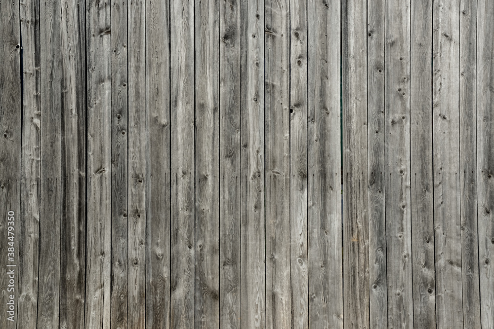 Vertical and rustic gray wood plank barn wall Quebec Canada Vertical and rustic gray wood plank barn wall Quebec Canada