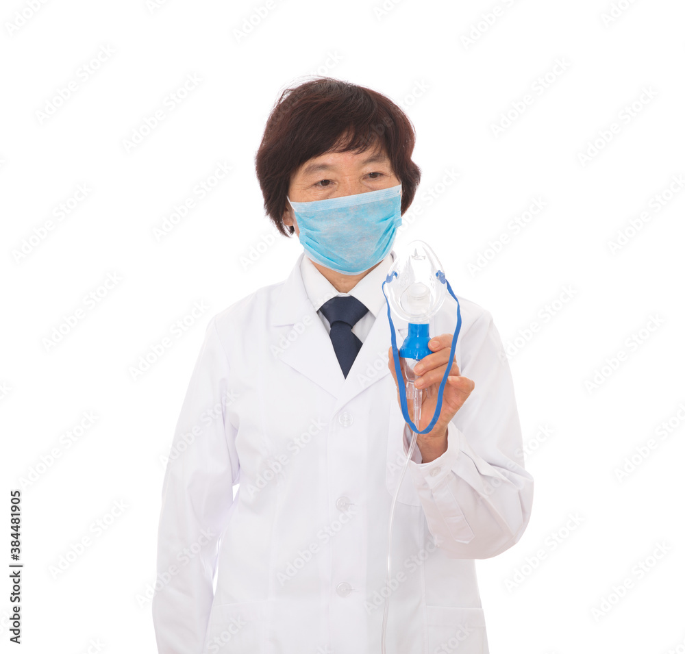 A respiratory doctor in a white coat is holding a nebulization tool in hand A respiratory doctor in a white coat is holding a nebulization tool in hand