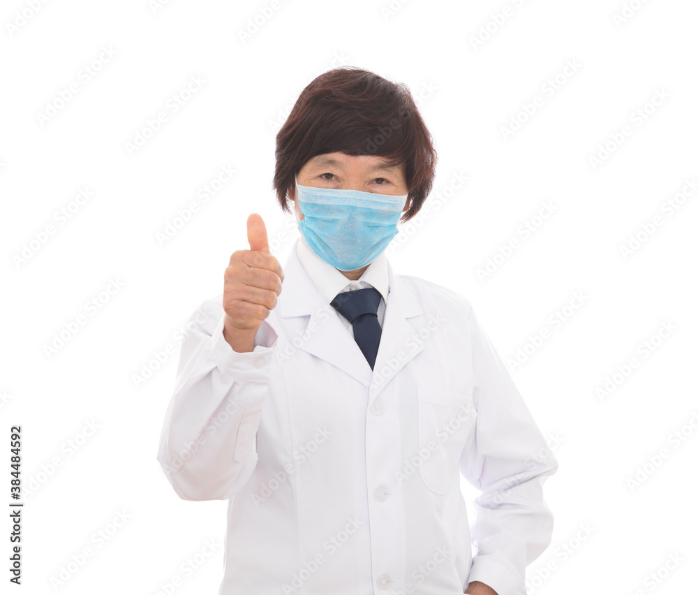Thumbs up female doctor wearing mask Thumbs up female doctor wearing mask