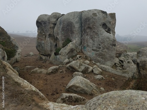 Rock formation in a misty foggy background © Edward
