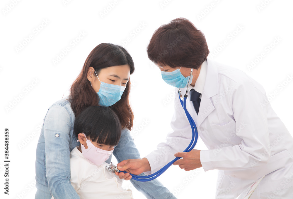 Pediatrician auscultates the lungs of children Pediatrician auscultates the lungs of children