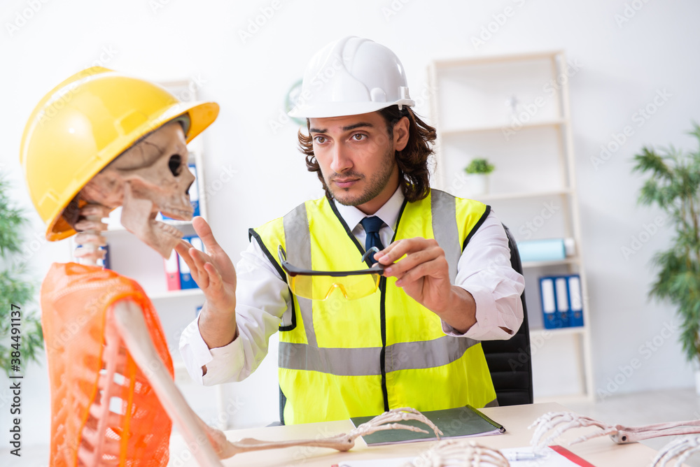 Funny construction business meeting with boss and skeletons Funny construction business meeting with boss and skeletons