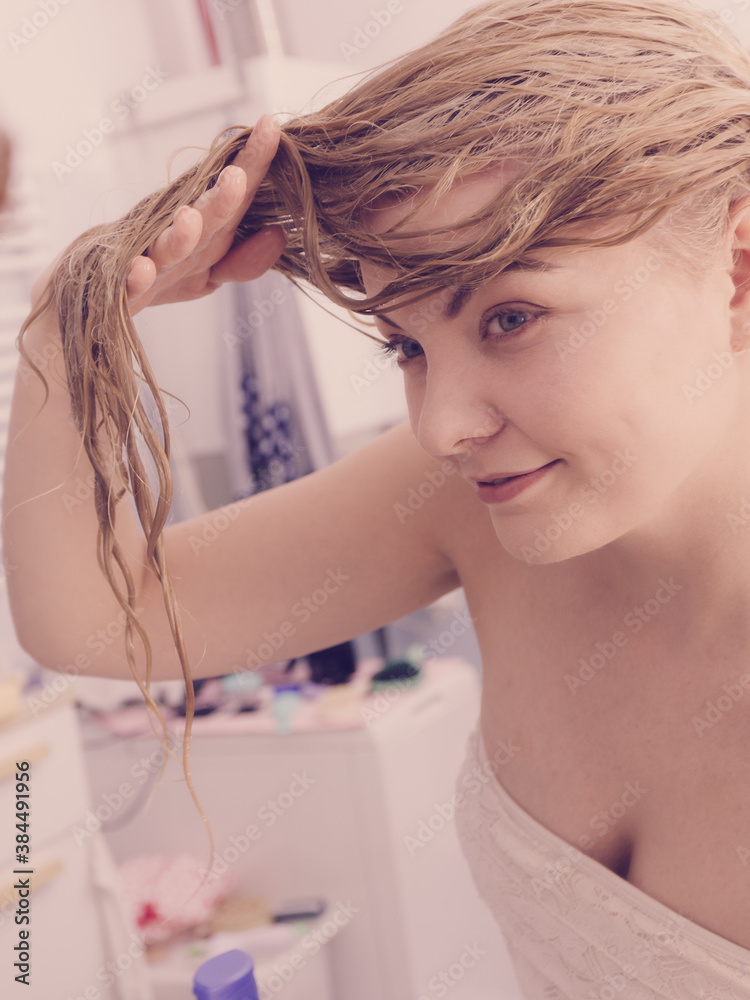 Naklejka premium Woman with wet blonde hair
