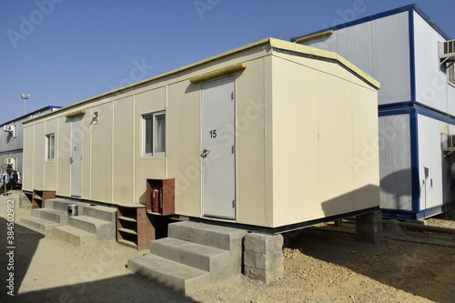 Portacabin, porta cabin, temporary labors camp , Mobile building in industrial site or office container Portable house and office cabins. Labor Camp. Porta cabin. small temporary houses © KG