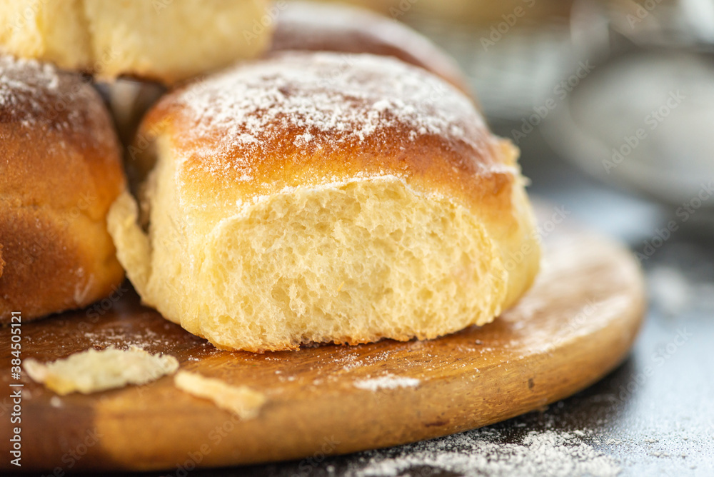 Sweet bread rolls with powdered sugar on top