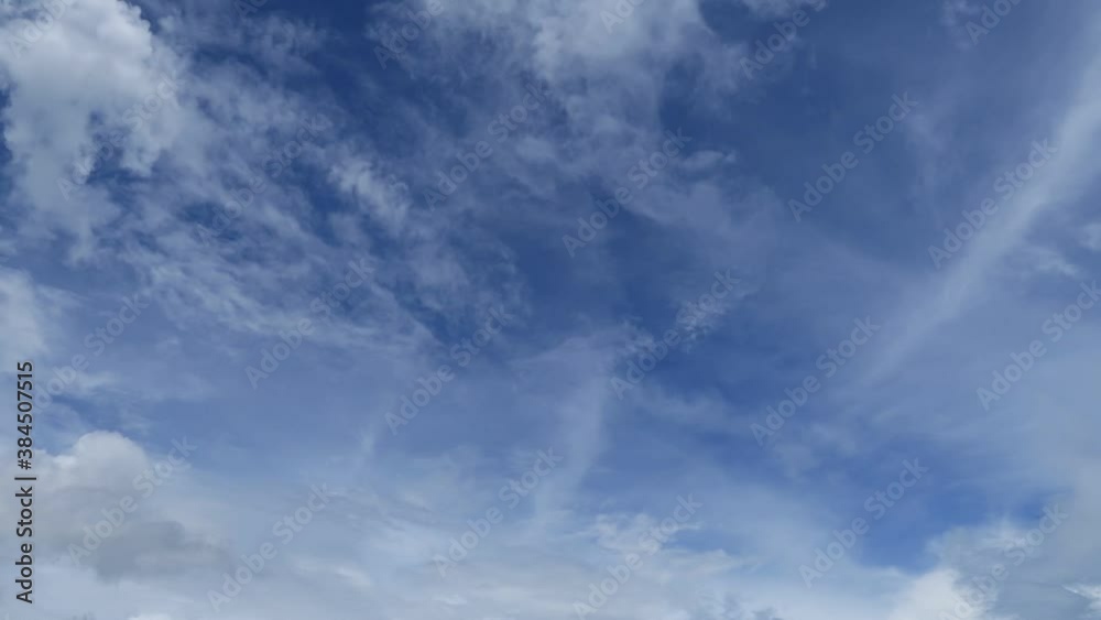 Beautiful sunny clear blue sky background with fluffy white clouds & building motion cloudscape moving fast on daylight horizon in tropical summer or spring sunlight at sunshine day, B-roll TimeLapse Beautiful sunny clear blue sky background with fluffy white clouds & building motion cloudscape moving fast on daylight horizon in tropical summer or spring sunlight at sunshine day, B-roll TimeLapse