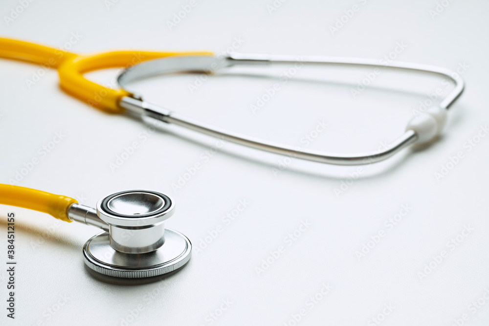Doctor stethoscope lies on the table close up. Doctor stethoscope lies on the table close up.