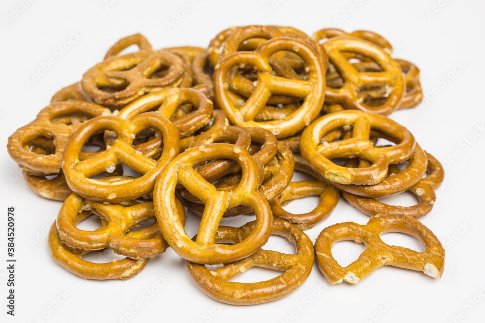 heap of mini spelt pretzel with salt heap of mini spelt pretzel with salt