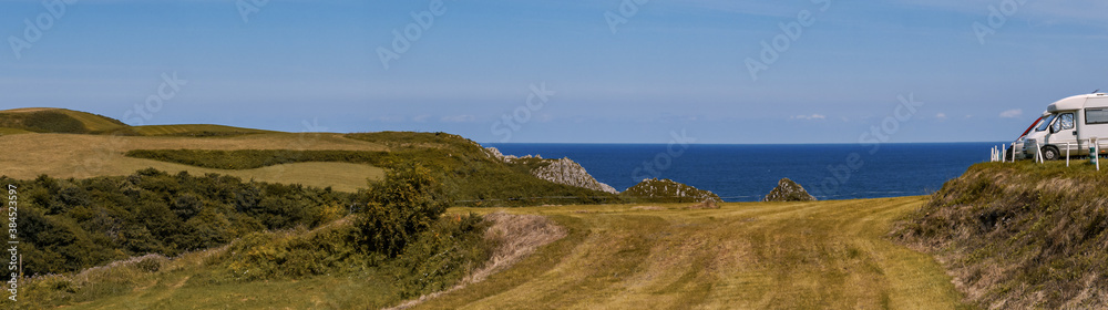 Panoramic view of a beach from a country road Panoramic view of a beach from a country road