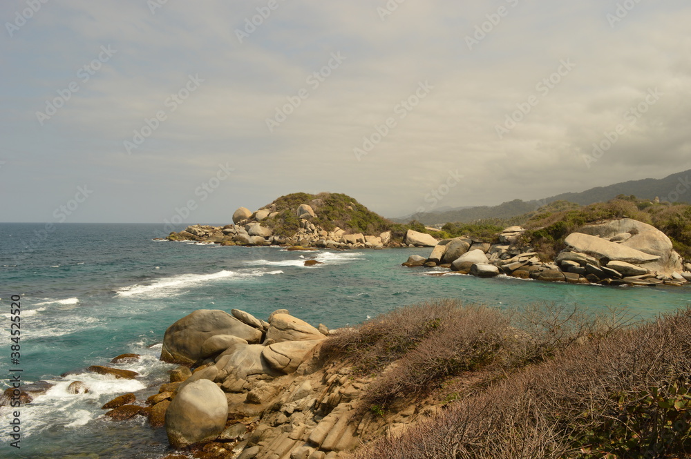 The stunning beaches and mountains of Parque Nacional Natural Tayrona in Santa Marta region of Colombia The stunning beaches and mountains of Parque Nacional Natural Tayrona in Santa Marta region of Colombia