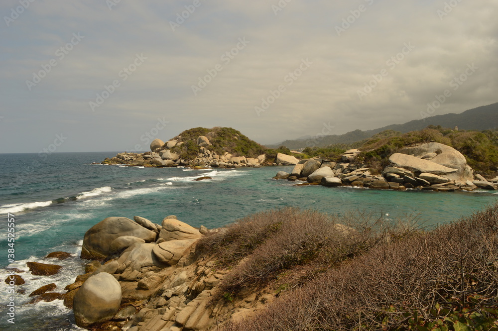 The stunning beaches and mountains of Parque Nacional Natural Tayrona in Santa Marta region of Colombia The stunning beaches and mountains of Parque Nacional Natural Tayrona in Santa Marta region of Colombia