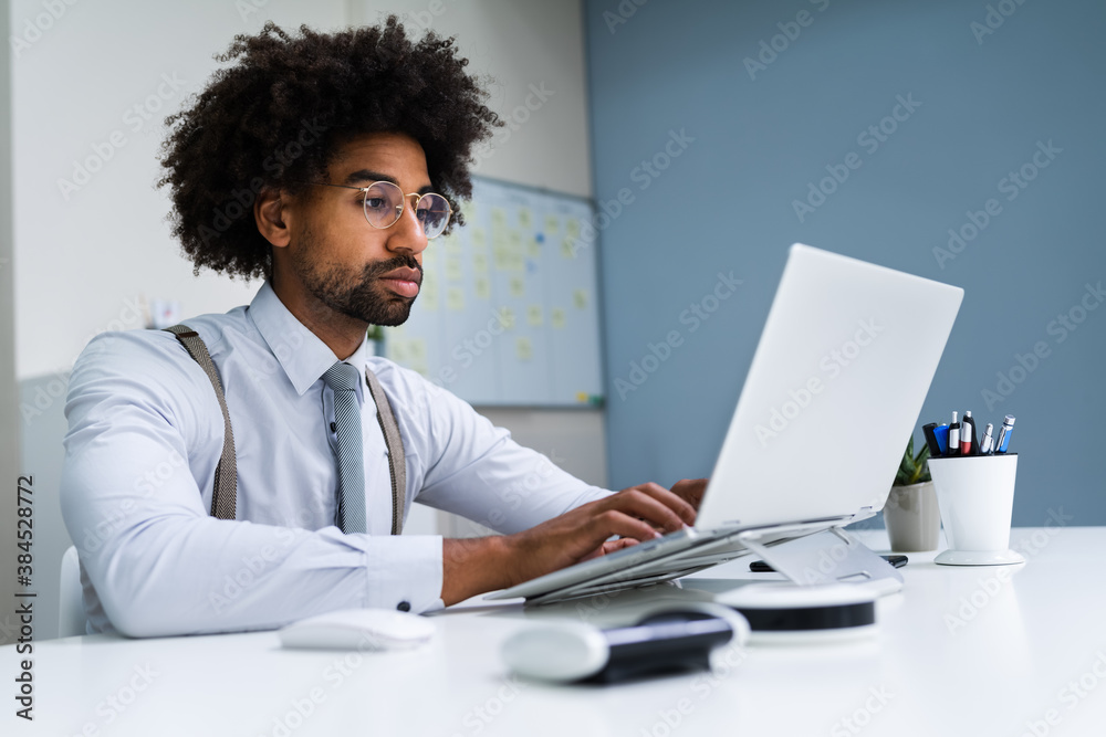 African American Business Man Using Laptop Computer African American Business Man Using Laptop Computer
