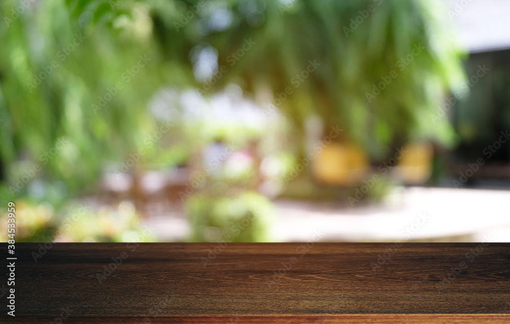 Wood Table Top in Blur Background room interior with empty copy space. Wood Table Top in Blur Background room interior with empty copy space.