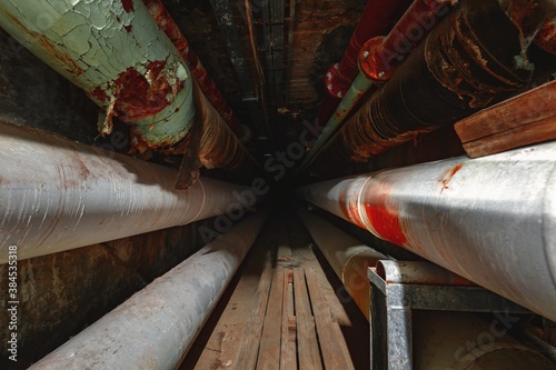 Dark underground tunnel made out of pipes