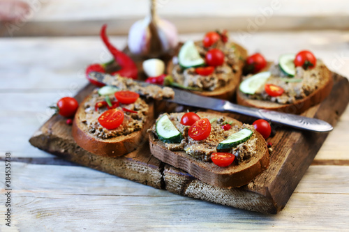 Canvas Print Selective focus. Sandwiches with pâté and cherry tomatoes.