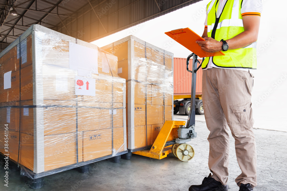 Workers Holding Clipboard is Checking Packaging Boxes in Warehouse. Inventory Management Supply Chain. Shipment Boxes. Shipping Warehouse Logistics. Workers Holding Clipboard is Checking Packaging Boxes in Warehouse. Inventory Management Supply Chain. Shipment Boxes. Shipping Warehouse Logistics.