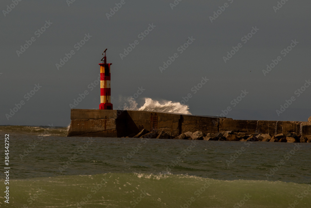 Lighthouse and waves