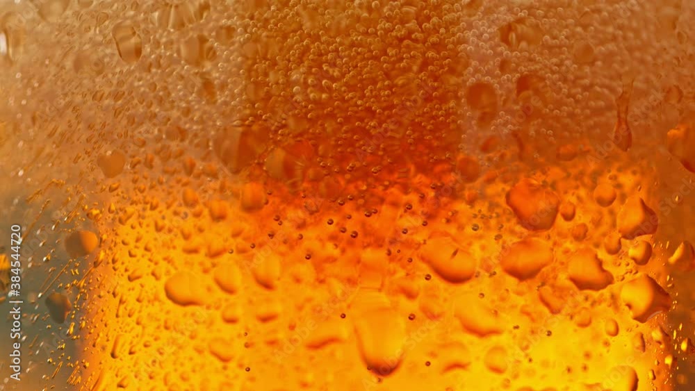 Macro Shot Of Bubbles Rising In A Glass With Beer, Super Slow Motion at 1000 fps.