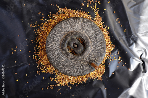 Tradition An Old Indian Hand Flour Mill. Grinding CHICKPEAS .