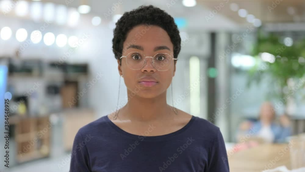 Portrait of Casual African Woman feeling Shocked Portrait of Casual African Woman feeling Shocked