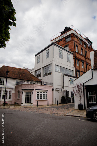 Buildings in a Londond Street with Cloudy Sky as Background