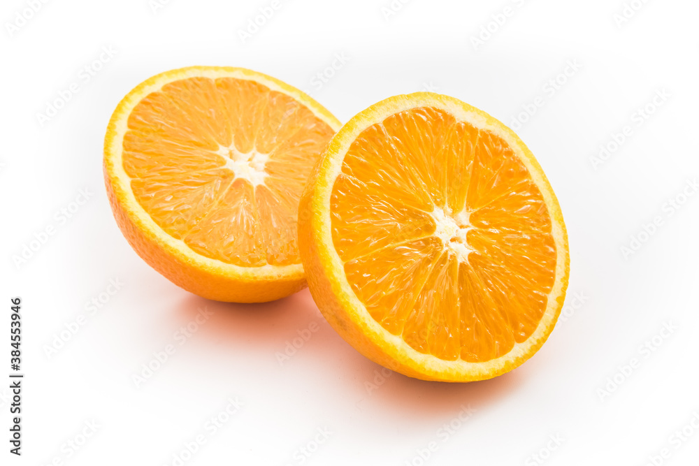 Ripe orange isolated on white background - fresh citrus fruit photography, orange cut in half Ripe orange isolated on white background - fresh citrus fruit photography, orange cut in half