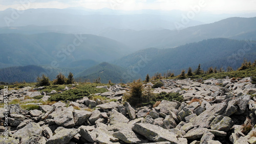 The hill is covered with stones. A heap of boulders in the mountains. © DenisProduction.com