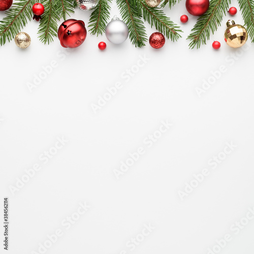 Square christmas card with fir decorations on white background