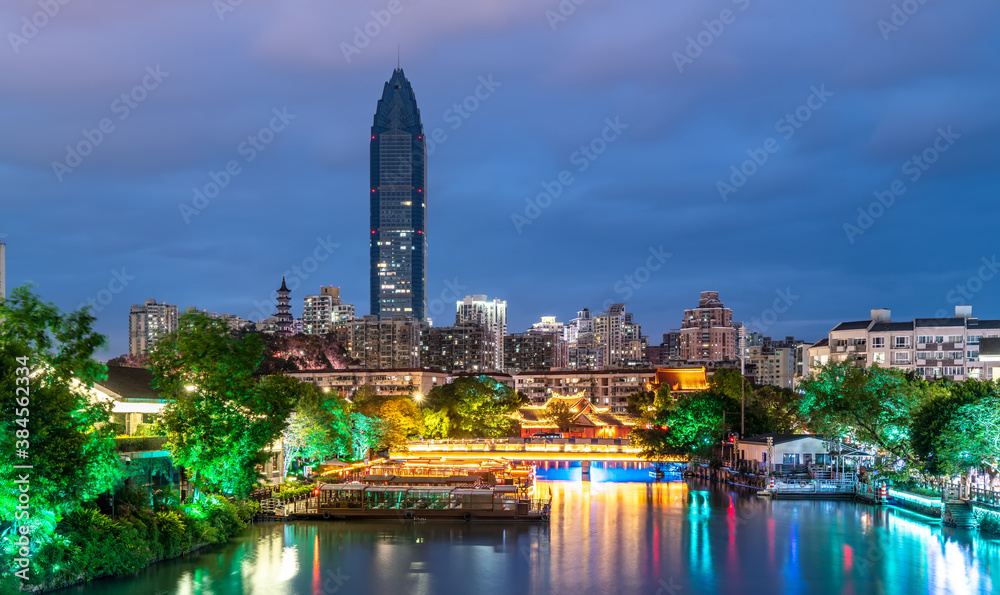 Obraz premium The night view of ancient buildings and modern urban buildings in Nantang Street, Wenzhou
