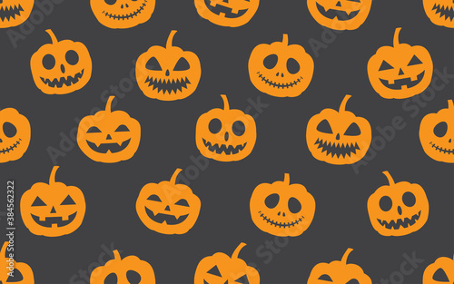 Seamless pattern of Halloween pumpkin on dark background