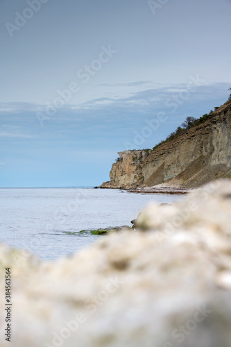 Limestone rocks with cliff and ocean background