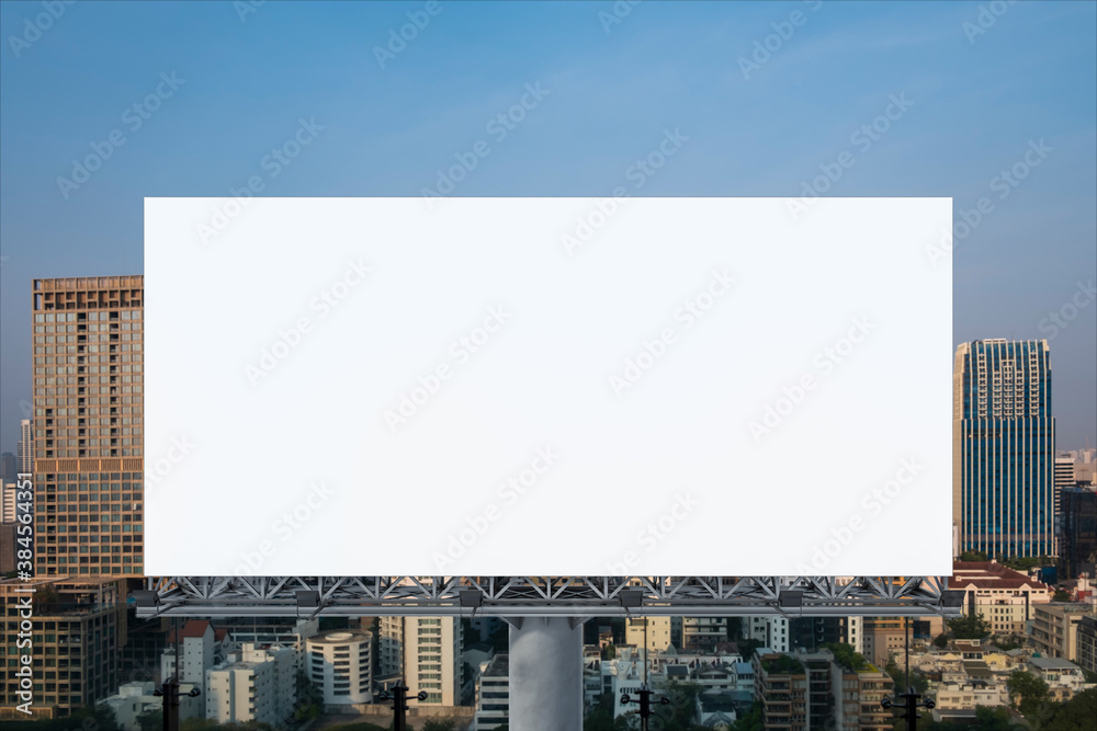 Blank white road billboard with Bangkok cityscape background at sunset. Street advertising poster, mock up, 3D rendering. Front view. The concept of marketing communication to promote or sell idea. Blank white road billboard with Bangkok cityscape background at sunset. Street advertising poster, mock up, 3D rendering. Front view. The concept of marketing communication to promote or sell idea.