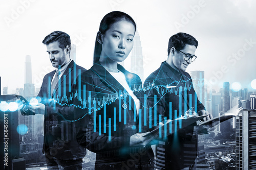 Photography Group of business colleagues in suits as a part of multinational corporate team working on forecasting trading corporate strategy at fund
