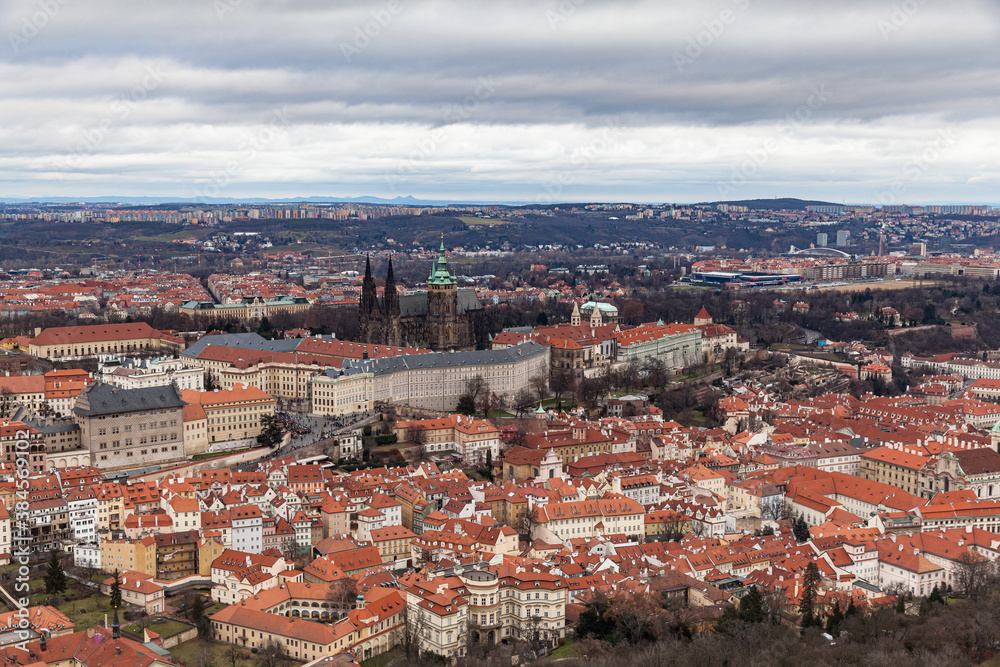 Aerial view of e of Prague Castle and Metropolitan Cathedral of Saints Vitus with historic buildings of Mala Strana district from Petrin Hill on the day with Czech Republic