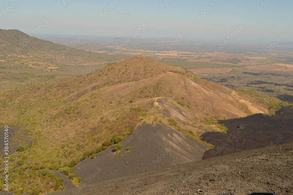 Hiking and snowboarding in the volcanic ashes on the Nicaraguan Volcanoes outside of Léon, Central America