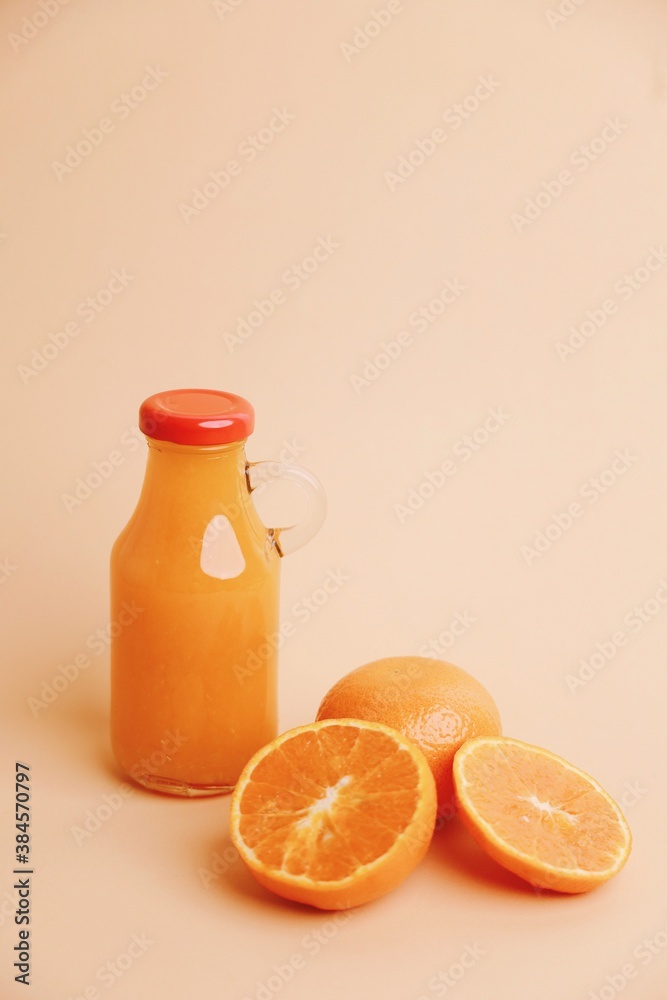 Fresh orange juice bottle and fresh orange. Fresh orange juice bottle and fresh orange.