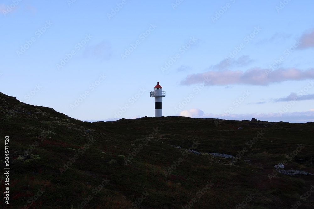 A small lighthouse on the coast of Vesteralen islands in Northern Norway