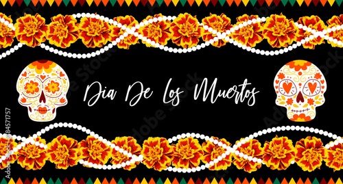 Marigold flower garland and skull. Day of the dead. Halloween. Mexican garland of flowers. Religion festive holiday decoration. Black background. Mexican Day of the dead frame